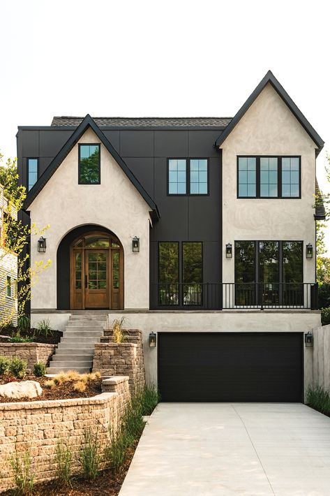 Modern French Exterior Homes, Transitional Tudor Exterior, Contemporary Traditional Home Exterior, Black Stucco Exterior, Garage In Back Of House, Modern French Tudor Style Homes, Contemporary Tudor, Dark Stucco, House Outdoor Color Ideas