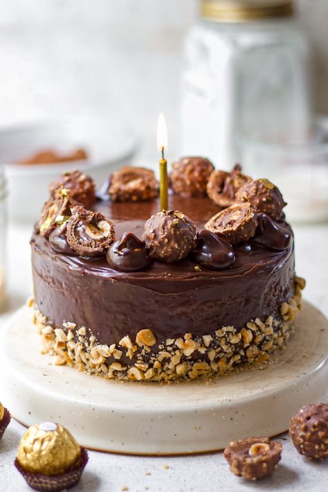 ferrero rocher cake in saucepan - Bake with Shivesh Chocolate Cake Ferrero Rocher, Cake Ferrero Rocher, Ferrero Cake, Bake With Shivesh, Rocher Cake, Ferrero Rocher Cake, Chocolate Fudge Frosting, Eggless Cake Recipe, Eggless Desserts