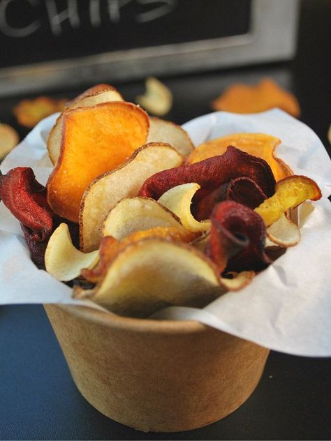 I'm convinced these are health food, after all they're vegetables! A colorful combination of yucca, parsnips, sweet potatoes, gold and red beets, and taro root with a healthy dash of sea salt. The Art of Fine Living at www.garyinman.com Healthy Salty Snacks, Honey Roasted Almonds, Beet Chips, Parmesan Chips, Healthy Chips, Vegetable Chips, Veggie Chips, Homemade Applesauce, Root Vegetable