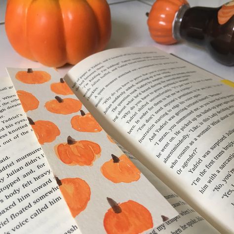 "Celebrate \"Hot Book Autumn\" with a pumpkin patterned bookmark for your cozy fall reads! -bookmarks sold individually -approx. 1.5\" x 6\" -pattern will vary -one sided -not waterproof" Autumn Creative, Book Bookmark Design, Halloween Bookmark Ideas, Book Mark Ideas Drawing, Fall Bookmarks Diy, Diy Fall Bookmarks, Pumpkin Bookmark, Bookmark Art Ideas, Watercolor Bookmark Ideas