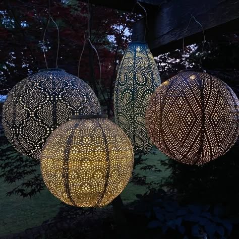 The globe ikat lantern with it's shimmery copper is made of durable Tyvek™ material that is weatherproof, colorfast and tough enough to be left hanging outside! Pairs well with other hanging lanterns. SPECIFICATIONS Dimensions: 11.8" x 11.8" x 7.4"Finish: CopperMaterial: Weather-resistant and 100% recyclable TyvekContains: Come with 2 AAA batteries and remote control with battery. Remote has dimmer and 4 timers.Ships: Ground Delivery, Shipping is included in the price.(No handling fee on orders Patio Lanterns, Solar Powered Lanterns, Blue Lantern, Japanese Lanterns, Iron Accents, Lantern Chandelier, Outdoor Hanging Lanterns, Garden Lanterns, Outdoor Gifts