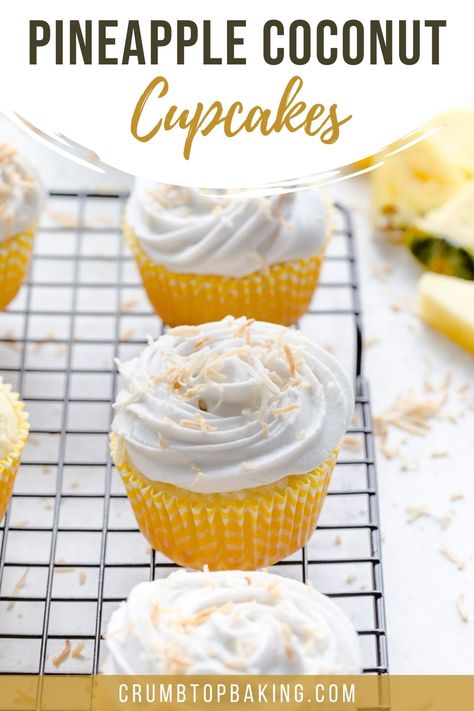 Up close view of pineapple coconut cupcakes on a wire rack. Pineapple Cupcakes Recipes, Pineapple Coconut Dessert, Pineapple Coconut Cupcakes, Cupcakes Coconut, Coconut Cupcake Recipes, Coconut Whip, Pineapple Cupcakes, Delicious Cupcakes Recipes, Boozy Cupcakes