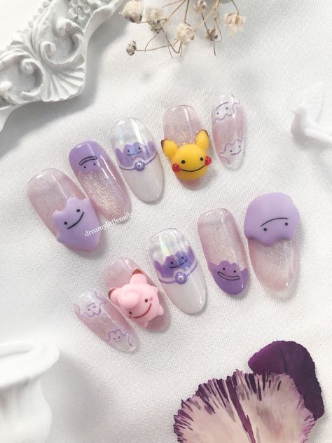 Ditto, Ditto Pikachu, and Ditto Clefairy 3D and glow in the dark press-on nails. Check out the glow on IG!! #ditto #dittonails #pokemon #pokemonnails #kawaii #3Dnails Ditto Nails Pokemon, Nails 2023 Art, Ditto Nails, Gengar Nails, Kawaii Nail Designs, Pochacco Nails, Anime Nails Art, Kirby Nails, Sanrio Nail Art