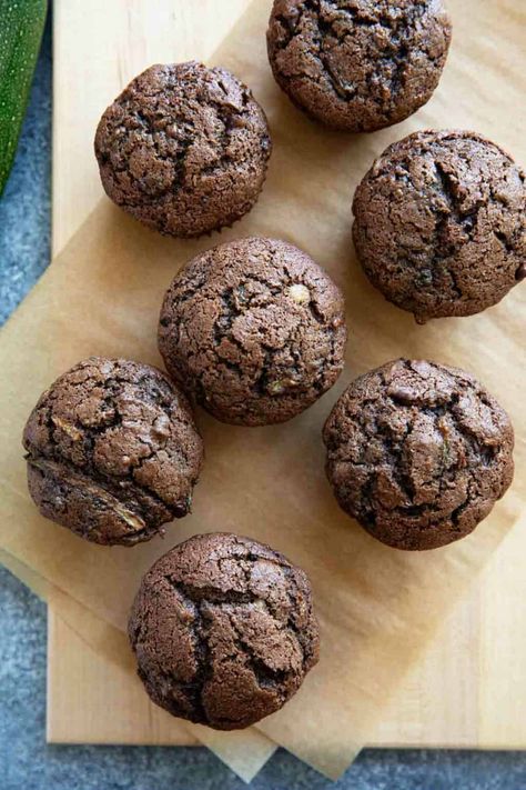 Filled with chocolate and a hint of spice, these Chocolate Zucchini Muffins are a great way to use up that bountiful zucchini harvest. Zucchini Muffins Chocolate, Zucchini Chocolate Muffins, Muffins Chocolate, Zucchini Chocolate, Chocolate Zucchini Muffins, Zucchini Muffins, Chocolate Zucchini, Chocolate Muffins, Zucchini