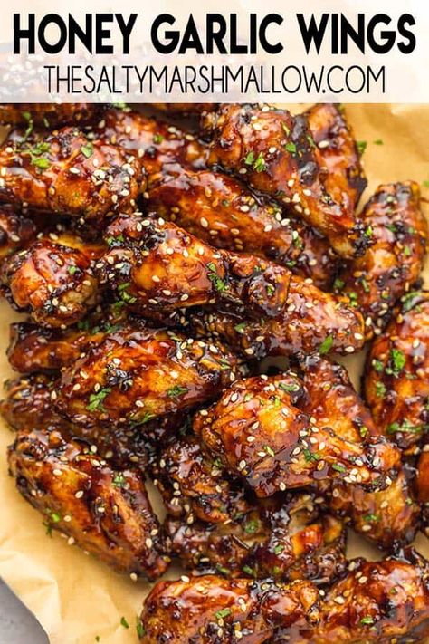 Honey Garlic Wings are oven baked and easy to make for dinner or as an appetizer!  These wings are coated in the best thick, rich, sticky honey garlic sauce ever! Honey Bbq Sauce For Wings, Honey Garlic Chicken Wing Sauce Recipe, Baked Honey Garlic Chicken Wings, Wings Recipe Air Fryer, Garlic Wing Sauce, Sticky Honey Garlic Chicken Wings, Stinging Honey Garlic Wing Sauce, Saucy Wings, Wing Sauce Recipe