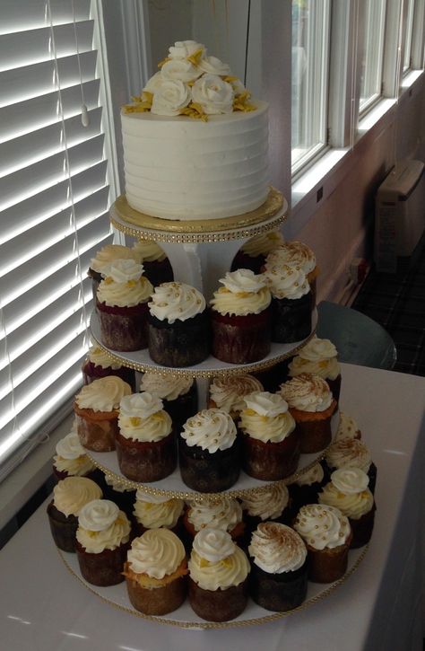 Cupcake tower with gold accents for a 50th Anniversary Party. You choose the cupcake & icing flavors, we do the rest! 732-530-3337 50th Anniversary Party Ideas Cakes, 50th Anniversary Cupcake Ideas, 50th Anniversary Cake Ideas For Parents, 50th Anniversary Party Themes, 50th Wedding Anniversary Party Food, 70th Anniversary Party Ideas, 50th Anniversary Party Ideas Food, 50th Wedding Anniversary Cakes Gold, 50th Anniversary Cupcakes