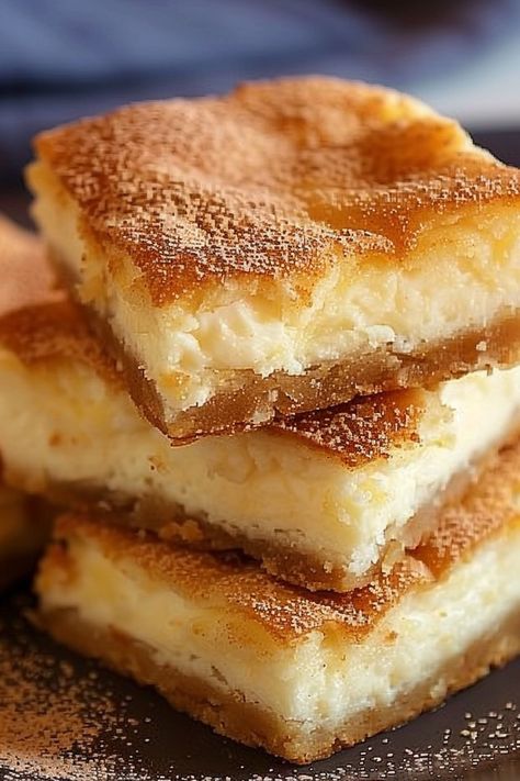 Crescent Cheesecake Bars Croissant Cheesecake Bars, Cheesecake Squares Crescent Rolls, Churro Cheesecake Bars Crescent Rolls, Cheesecake Bars Crescent Rolls, Crescent Roll Cheesecake Bars, Crescent Cheesecake Bars, Crescent Roll Cheesecake Recipes, Cinnamon Churro Cheesecake Bars, Lemon Cheesecake Crescent Rolls