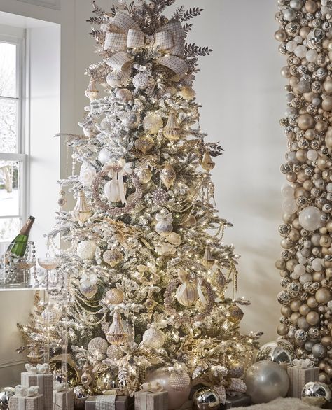 Our Champagne Wishes Christmas Tree Theme is an elegant DREAM that you need this holiday season! Some items IN STOCK now and others are arriving daily! ✨ Click the link in our bio to shop! #christmas #christmasdecor #christmashomedecor #christmasdecorations #christmasideas #christmasdecorideas #christmastreetheme #Christmastreeideas #decoratingideas #goldchristmas Gold Nude Christmas Tree, Lace And Pearl Christmas Tree, Blingy Christmas Table, Gold Copper White Christmas Tree, White Gold Silver Xmas Tree, Silver Gold Rustic Christmas Tree, Gold Sparkly Bow Tree Topper, Rose Gold Christmas Tree Tinsel, White Flocked Christmas Tree Rose Gold