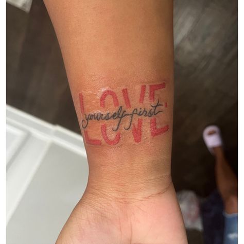 ✨✨"Love Yourself First" Love Yourself Tattoos For Black Women, F.l.y First Love Yourself Tattoo, First Love Yourself Tattoo, Love Flower Tattoo, Love Yourself Tattoos For Women, First Love Tattoos, Female Quote Tattoos, 1st Tattoo Ideas For Women, Tattoo Ideas For Women Back