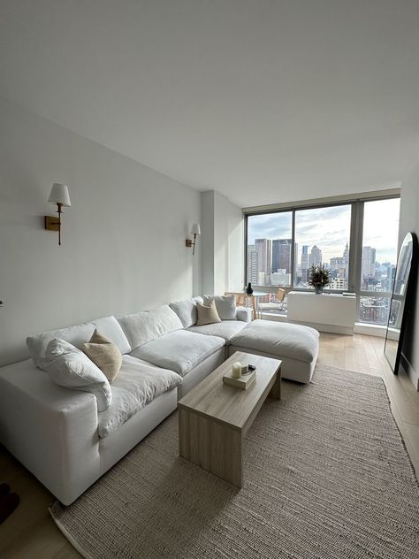 White Couch Inspiration, White Small Apartment Aesthetic, White Aesthetic Living Room Ideas, White Sofa Apartment, Apartment Couches Ideas, Nyc Living Room Ideas, White Cloud Couch Living Room Decor, White Couch Living Room Apartment, Sectional Sofa Apartment