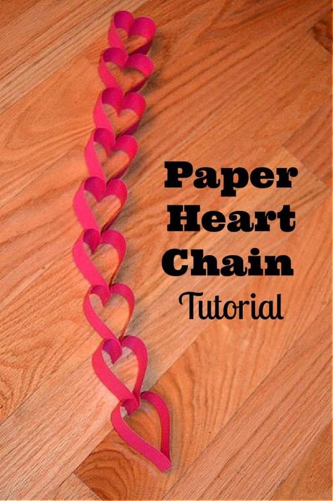 DIY Paper Heart Chain For Valentine’s Day- step by step directions for making a heart paper chain with photos and video. #heartcrafts Heart Chain Craft, Heart Decorations Diy, Hearts Paper Crafts, Paper Heart Garland, Valentine Garland, Diy Valentine's Day Decorations, Paper Chain, Heart Paper, Diy Valentines Decorations