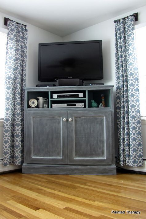 Build your own "Get Out of the Way of the TV" console. With cabinets for toys and books! Move TV to where leather chair is. Tall Corner Tv Stand, Media Console Diy, Build A Tv Stand, Corner Entertainment Center, Corner Tv Console, Tv Stand Plans, High Tv Stand, Tall Tv Stands, Tv Corner