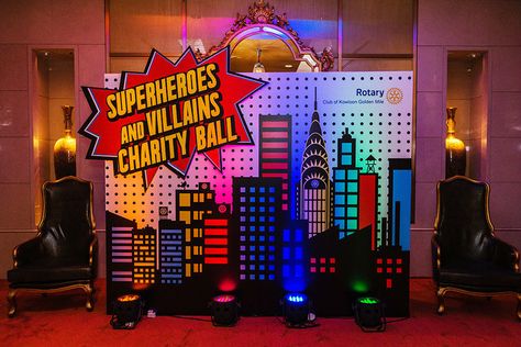 Villian Party Ideas, Corporate Party Theme, Superhero Themed Party, Superhero Backdrop, Auction Themes, Villains Party, Comic Party, Superhero Decorations, Charity Ball