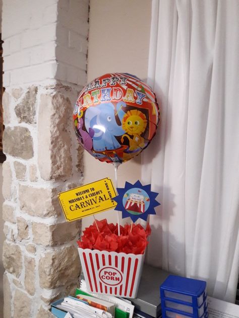 Carnival birthday party centerpiece idea diy. Ordered balloons on eBay, popcorn bucket from dollar tree and printed off the rest. Popcorn Bucket Centerpiece, Homecoming Centerpieces, Bucket Centerpiece Ideas, Box Centerpiece Ideas, Bucket Centerpiece, Outdoor Movie Party, 24th Anniversary, Box Centerpiece, Carnival Birthday Party