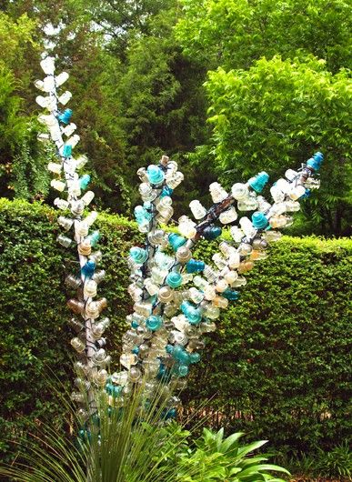 Dishfunctional Designs: Vintage Glass Insulator Crafts.  I am nuts about bottle trees & nuts about glass insulators.  Why didn't I think of this? Bottle Trees, Repurposed Art, Bottle Tree, Glass Garden Art, Glass Insulators, Glass Garden, Glass Flowers, Garden Crafts, Art Crafts