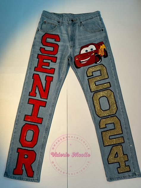 Graduation Pants Ideas, Senior Jeans Patches, Homecoming Jeans Ideas Freshman, Lightning Mcqueen Graduation Cap, Senior Pants Ideas 2024, Senior Clothes, Senior Jeans Painted 2024 Ideas, Senior Pants 2025, Senior Year Pants