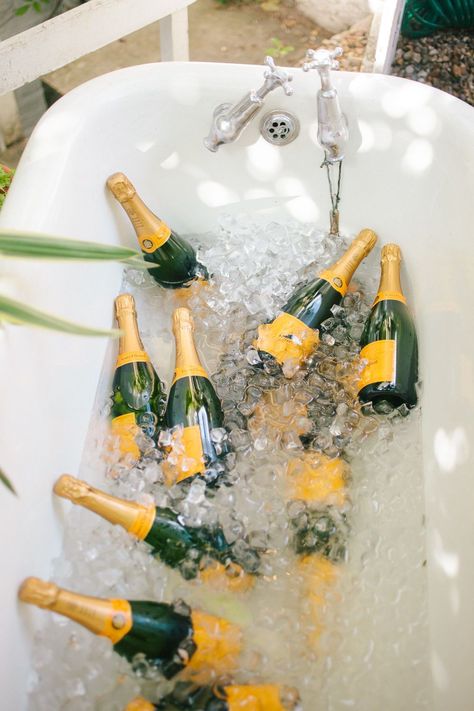 Let's fill the bathtub with Champagne! :) Absolutely, and it was exactly what we did at Nina + Sergio's pub style wedding bash in Dalston, East London. Looked great in the garden of The Roost, a fab venue, filled with props and all the different rooms you can wish for to explore. #Londonwedding #nontraditionalweddingvenue #Londonweddingplanner #Weddingplanningideas Champagne In Bathtub, Miami Style Party Decor, Wedding Drink Decor, Champagne Bathtub, Bejeweled Party, Wedding Bars, Birthday 27, Shower Gif, Veuve Cliquot