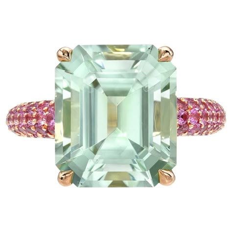 7.70 Carat Mint Green Tourmaline 18K Rose Gold Ring with Pink Sapphires Discover unparalleled luxury with this extraordinary Mint Green Tourmaline ring, a creation that embodies sophistication and rarity. Featuring a 7.70-carat emerald-cut Mint Green Tourmaline at its heart, this masterpiece is set in radiant 18K rose gold and enhanced by 1.66 carats of vibrant round Pink Sapphires. Each detail is meticulously crafted to create a timeless design that celebrates the beauty of rare gemstones and t Paraiba Tourmaline Gemstone, Large Emerald Cut Engagement Ring, Pink Stone Jewelry, Emerald Cut Aquamarine Ring, Diamond Pave Ring, Pink Diamonds Engagement, Rose Gold Ring Set, Art Deco Emerald Ring, Green Luxury