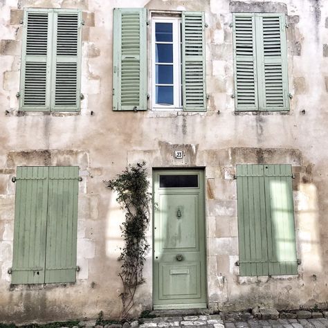 Charming and rustic French farmhouse exterior with Vert Olivier Green Shutters - photo by Vivi et Margot. French Green Color, French Green Paint, French Farmhouse Exterior, Green White Decor, French Country Interiors, Shutter Colors, French Farmhouse Kitchen, Painting Shutters, Green Shutters