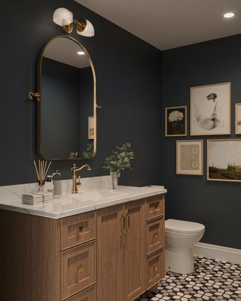 Who loves a moody powder room - we do!! 👋🏻👋🏻 - - - - - - - #interiordesign #interiordesigner #homedecor #homedesign #interiorinspo #interiordecorating #interiorstyling #interiordetails Moody Spare Bathroom, Black And Gold Finishes In Bathroom, Moody Full Bathroom, Small Bathroom Black Walls, Midcentury Powder Room Ideas, Navy Cabinet Bathroom, Moody Teal Bathroom, Light Moody Bathroom, Moody Bathroom No Window