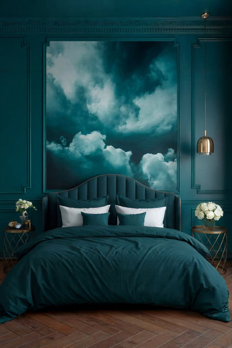 A moody bedroom that is teal colored, including a teal painted wall, teal bedding, and a cloud painting with a teal hue. Deep Teal Bedroom, Home Bedroom Refresh, Moody Bedrooms, Moody Bedroom Ideas, Teal Bedroom, Cozy Fall Bedroom, Porch House Plans, Moody Bedroom, Home Design Software