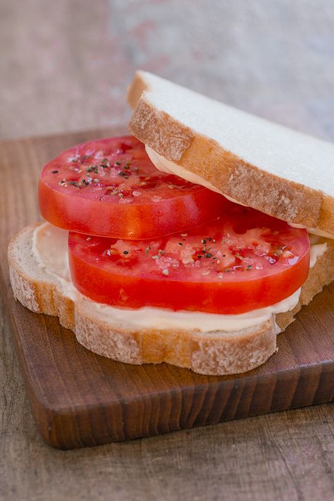 Hellmann’s Mayonnaise, salt, pepper, and ripe tomatoes make for a super fresh sandwich. Healthy Tomato Sandwich, Marinated Tomato Sandwich, Tomatoe Sandwich Mayo, Egg And Tomato Sandwich, Tomatoe Basil Mozzarella Sandwich, Blt Sandwich Recipes, Sandwich Bites, Tomato Sandwiches, Recipes Sandwiches