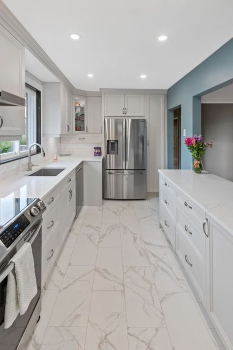 Small Gully Kitchen Ideas, Kitchen With White Marble Floors, Kitchen Tile For White Cabinets, Apartment Kitchen Tile Floor, Small Elegant Kitchen Ideas, White Tile Flooring Kitchen, Small Double Gallery Kitchen Design, Small Kitchen Tiles Ideas Floors, Best Kitchen Tile Floors