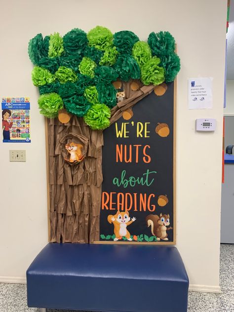 Children’s area library bulletin board Reading Lab Classroom Decor, Tree Library Display, Nuts About Reading Bulletin Board, Reading Room Door Decoration, We're Nuts About Fall Bulletin Board, Library School Decoration, Library Wall Decor School, Preschool Library Bulletin Board Ideas, Classroom Library Wall Decor