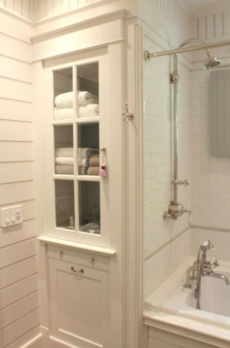 Smart bathroom storage makes use of a narrow space with great molding and a glass-front door.  Plus the exposed thermostatic shower... Rustic Farmhouse Bathroom Ideas, Makeover Kamar Mandi, Small Bathroom Remodel Designs, Farmhouse Bathroom Remodel, Rustic Farmhouse Bathroom, Bathroom Linen Cabinet, Bad Inspiration, Linen Cabinet, Bathroom Remodel Designs