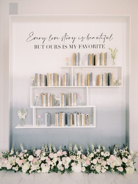 Wedding Seating Display Ideas, Bookshelf Wedding Decor, Wedding Seating Chart Using Books, Seating Chart Creative, Diy Classic Wedding Decor, Book Wall Seating Chart, Boho Table Seating Chart, Story Book Seating Chart, Seating Chart Bookshelf