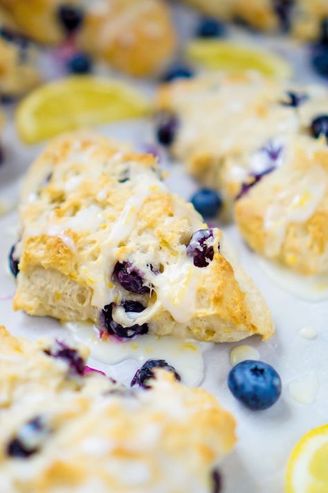 Glazed Lemon Blueberry Scones Recipe: Bake your way to a great Easter or Mother's Day brunch with this a delicious pastry! It's a perfect breakfast recipe! | The Love Nerds Making Scones, Lemon Blueberry Scones, Best Scone Recipe, Blueberry Lemon Scones, Blueberry Scones Recipe, Cheesecake Oreo, Lemon Scones, Pumpkin Scones, Eggless Recipes