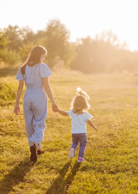 Free photo young mother and daughter, hu... | Free Photo #Freepik #freephoto #daughter #mother-daughter #young-mother #mother-child Mother Playing With Child, Mother Hugging Daughter, Mother And Daughter Holding Hands, Mother And Daughter Hugging, Art Wishlist, Mother And Children, Productive Moms, Golden Field, Mom And Child