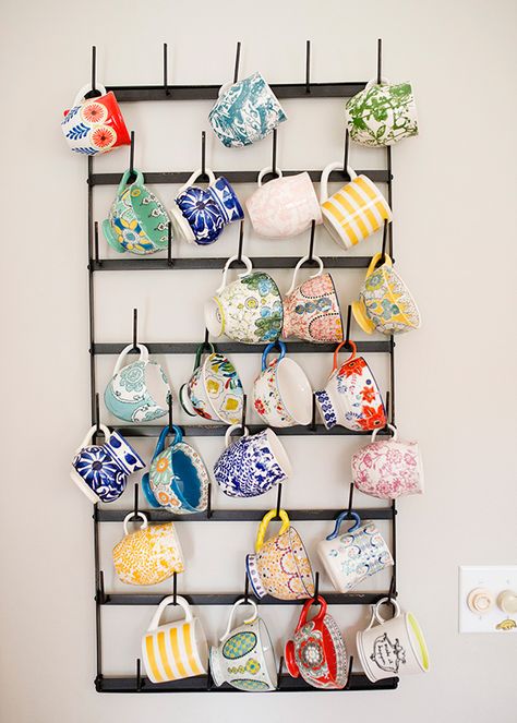 Cute ideas to organize coffee cups at your coffee bar!  ~Deborah. This blogger's coffee cup collection doubles as colorful wall art, punching up a plain wall in her mostly-neutral space. See more at Baked Brie » Hanging Mugs, Mug Storage, Mug Display, House Of Turquoise, Mug Rack, Diy Coffee, Kitchen Wall Decor, Organization Hacks, Kitchen Wall