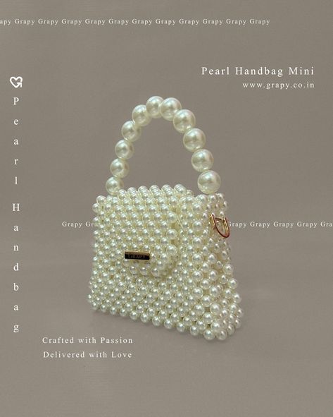 The sleek and structured pearl pattern, coupled with a clean, minimalist finish makes this a bag one that will stand the test of time 💫 Equipped with a pearl top handle and a magnetic closure, this bag will take you effortlessly from day to night ⭐️✨ Shop link in Bio 🛒 Product Name : Pearl Handbag - Mini Product Type : Beaded Bag (made from Beads & String) Material : Acrylic Pearls 🌷 100% Made in India 🇮🇳 🌷 100% Handmade 🌷 100% Made by Woman #grapyindia #grapyco #fypppppppppppppppppppp... Beaded Bags Pattern, Pearl Handbag, Pearl Pattern, Pearl Top, Bags Pattern, Pearl Bag, Beaded Bag, Bead Stringing, Beaded Bags