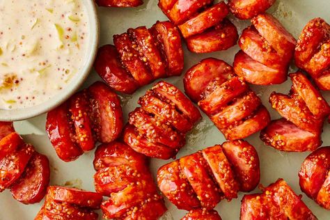 Hasselback Sausage Bites are a fun appetizer for your next gathering, sports-related or otherwise. Get more crispy, snappy bites of sausage with these sliced-up links.