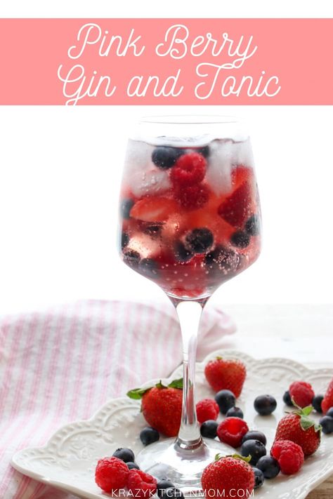 Pink Berry Gin and Tonic is a refreshing cocktail made with Pink Gin and filled with fresh strawberries, raspberries, and blueberries served over ice. Gin Tonic Recetas, Berry Gin, Pomegranate Gin, Best Gin And Tonic, Gin Fizz Cocktail, Lemon-lime Soda, Tonic Recipe, Potluck Party, Scrumptious Food