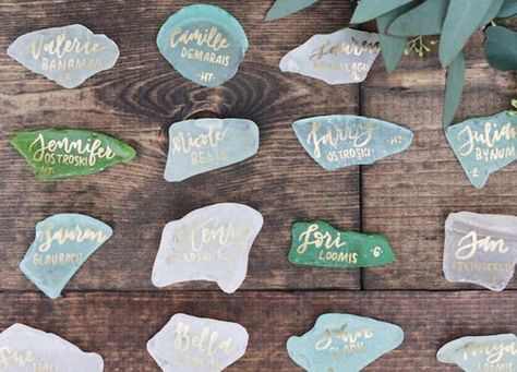 Creative Escort Card Ideas for Weddings - PureWow Leo Szn, Gold Beach Wedding, Name Place Cards Wedding, Sea Glass Wedding, Photobooth Ideas, Knot Tying, Wedding Details Card, Name Place Cards, Seating Cards