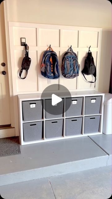 Betsy Dmitruk | Home Organizer on Instagram: "Cube storage, but make it cute 🥰 We don’t have a mudroom in our home, so the shoes and backpacks in the house were starting to drive me crazy. Enter: this inexpensive storage solution in our garage. What do you think of my DIY mudroom?? ⭐️Comment MUDROOM and I’ll DM you the products I used to make this space come to life!⭐️ . #garagemakeover #garageorganization #cubestorage #targetfinds #mudroomgoals @targetdoesitagain @loweshomeimprovement" Garage Bookbag Storage, Backpack Storage Drawer, Cube Shoe Storage Ideas, Classroom Backpack Storage Ideas, Diy Backpack Storage, Garage Shoe Storage Ideas, Backpack Storage Ideas, Bookbag Storage, Entryway Remodel