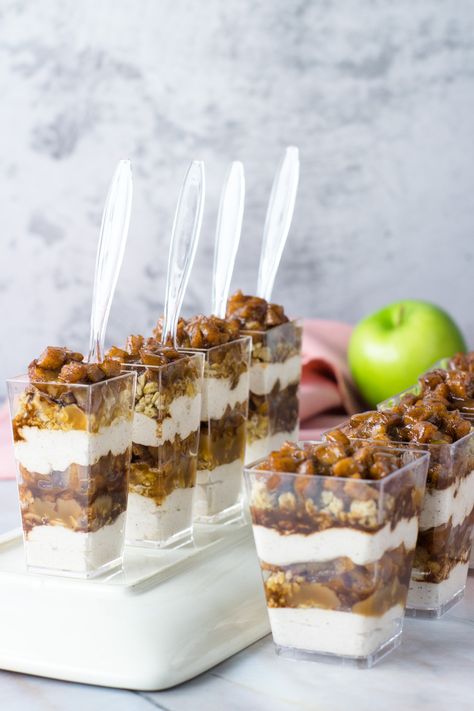 Looking for easy delicious Thanksgiving dessert ideas? These mini caramel apple trifles are perfect! Wow your guests with these beautiful mini desserts! Click for the full recipe and video!  #Thanksgiving #thanksgivingdessertidea #thanksgivingdessertideas #thanksgivingdessert #thanksgivingdesserts #desserts #dessertsforthanksgiving #dessertsthanksgiving #minidesserts #minidessertcups #holidaydesserts #holidaydessertideas #holidaydessert #trifles #caramel Mini Trifle Cups, Mini Dessert Cups Christmas, Mini Fall Dessert Cups, Mini Trifle Desserts Thanksgiving, Holiday Mini Desserts, Thanksgiving Recipes Dessert Trifle, Dessert Ideas For Thanksgiving, Dessert In Cup, Thanksgiving Dessert Triffle