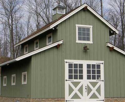 7 Gorgeous Green Horse Barn Exteriors - STABLE STYLE Barn Style Garage, Monitor Barn, Pole Barn Designs, Old World Home, Green Barn, Barn Living, Gambrel Roof, Barn Style House Plans, Barn Garage