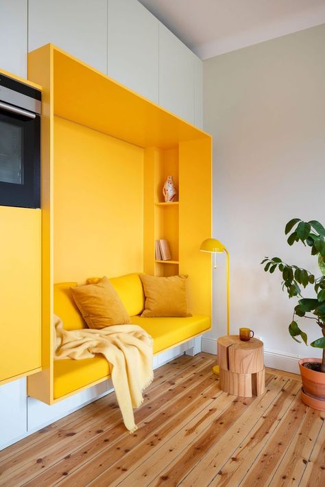 White And Yellow Interior Design: Tips With Images To Get It Right  #home #decor #idea #interior #decoration #remodel 1920s Apartment, Seating Nook, Built In Wall Units, Yellow Furniture, Designed Wall, Living Place, Yellow Interior, Yellow Walls, A Living Room