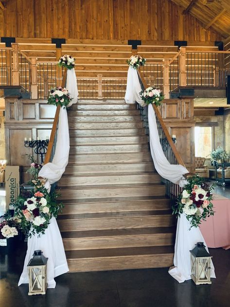 A beautiful staircase entry with florals and draping Wedding Staircase Decoration, Wedding Stairs, Wedding Staircase, Airplane Wedding, Draping Wedding, Rustic Wedding Colors, Green Themed Wedding, Floral Wedding Decorations, Wedding Backdrop Design