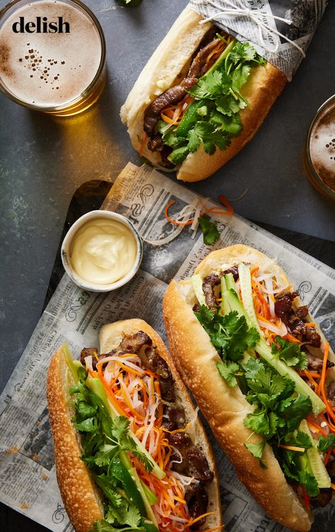 As far as Vietnamese street food goes, bánh mì earns top rankings for its irresistibly savory flavors—umami-packed pork, creamy mayonnaise, crunchy vegetables, and a light crispy baguette come together for sandwich perfection. Baguette, Banh Mi Aesthetic, Banh Mi Art, Bread Branding, Banh Mi Recipe, Street Food Design, Bahn Mi, Street Food Market, Food Pic