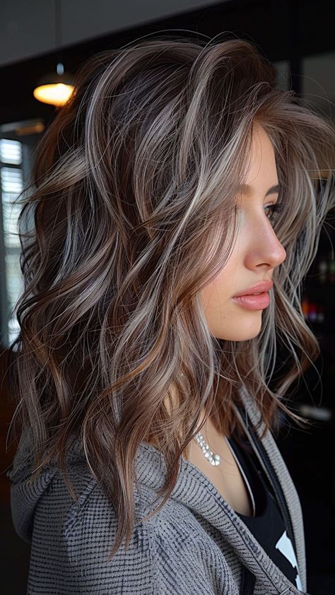 25 Silver Hair Color Ideas for an Easy, Chic Look Brown Hair With Silver Highlights, Rambut Brunette, Grey Hair Transformation, Grey Hair Inspiration, Brunette Hair With Highlights, Dark Hair With Highlights, Silver Hair Color, Blending Gray Hair, Gray Hair Highlights