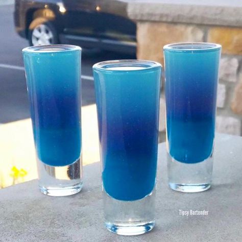 COSMIC SHOTS  Blue Curacao Peach Schnapps Viniq Berry Vodka Island Punch Pucke Blue Curacao Shots, Island Punch Pucker, Shots Alcohol Recipes, Beach Dessert, Alcohol Dispenser, Martinis Drinks, Candy Cocktails, Liquor Shots, Shots Alcohol