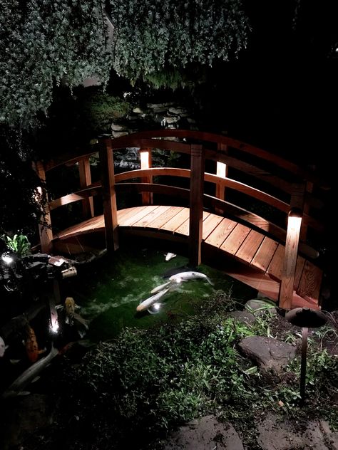 Bridge lighting Indoor Bridge Walkway, Pond With Bridge Backyard, Backyard Pond Bridge, Garden Pond With Bridge, Small Bridge Over Stream, Small Bridge Over Creek, Koi Pond Bridge, Small Bridges Over Creek, Pond Bridge Ideas