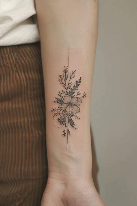 21 Stunning Black Feminine Floral Tattoo Designs You'll Love September Birth Tattoo Ideas, Tattoo February Birth Month, Be Resilient Tattoo, November And October Flower Tattoo, Flower Types Tattoo, Women’s Arm Tattoos Floral, February Birth Month Flower Tattoo, Five Flowers Tattoo, Small Flower Cluster Tattoo