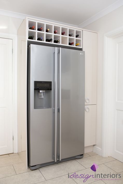 American style fridge freezer with surrounding gloss cream units in kitchen by Idesign Interiors Pantry With Freezer, Fridge Cabinet Surround, Modern Refrigerator, Modern Country Kitchens, Pantry Room, American Fridge, American Style Fridge Freezer, Country Kitchen Designs, American Fridge Freezers