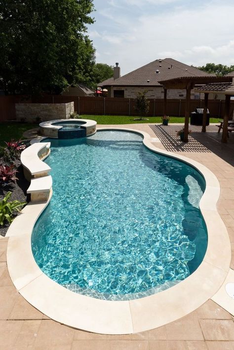 QuartzScapes Regular Series Mariner Blue | NPT Pool Finishes Free Form Pool With Hot Tub, Circle Pool Ideas, Simple Inground Pool Ideas Backyards, Free Form Pools With Spa, Concrete Pool Design, Water Features For Pools, Medium Size Pool Designs, Mexican Pool Design, Budget Friendly Pool Ideas