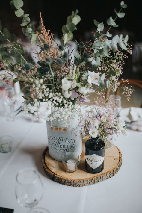 Gin Bottle Wedding Decorations, Gin Wedding Centrepiece, Gin Bottle Decoration, Gin Bottle Flowers Wedding, Flowers In Gin Bottles, Wedding Table Centerpieces Gin Bottles, Gin Bottles Decoration, Gin Bottle Centrepiece, Wild Flower Table Decorations